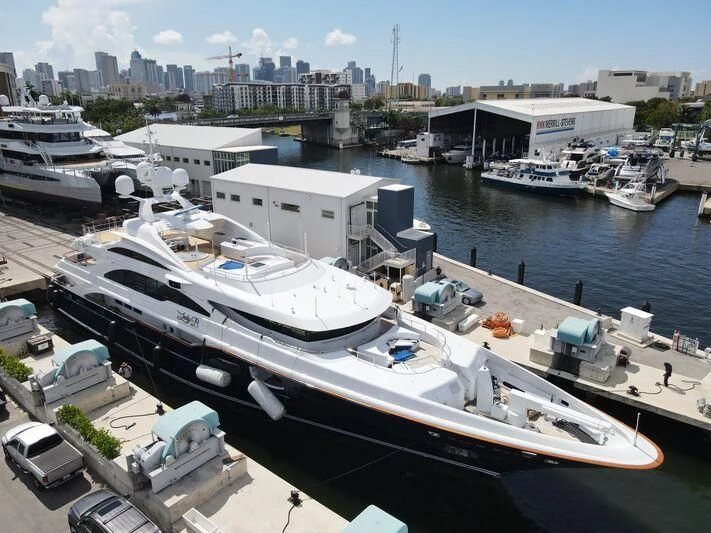 a large ship docked aboard LADY B Yacht for Charter