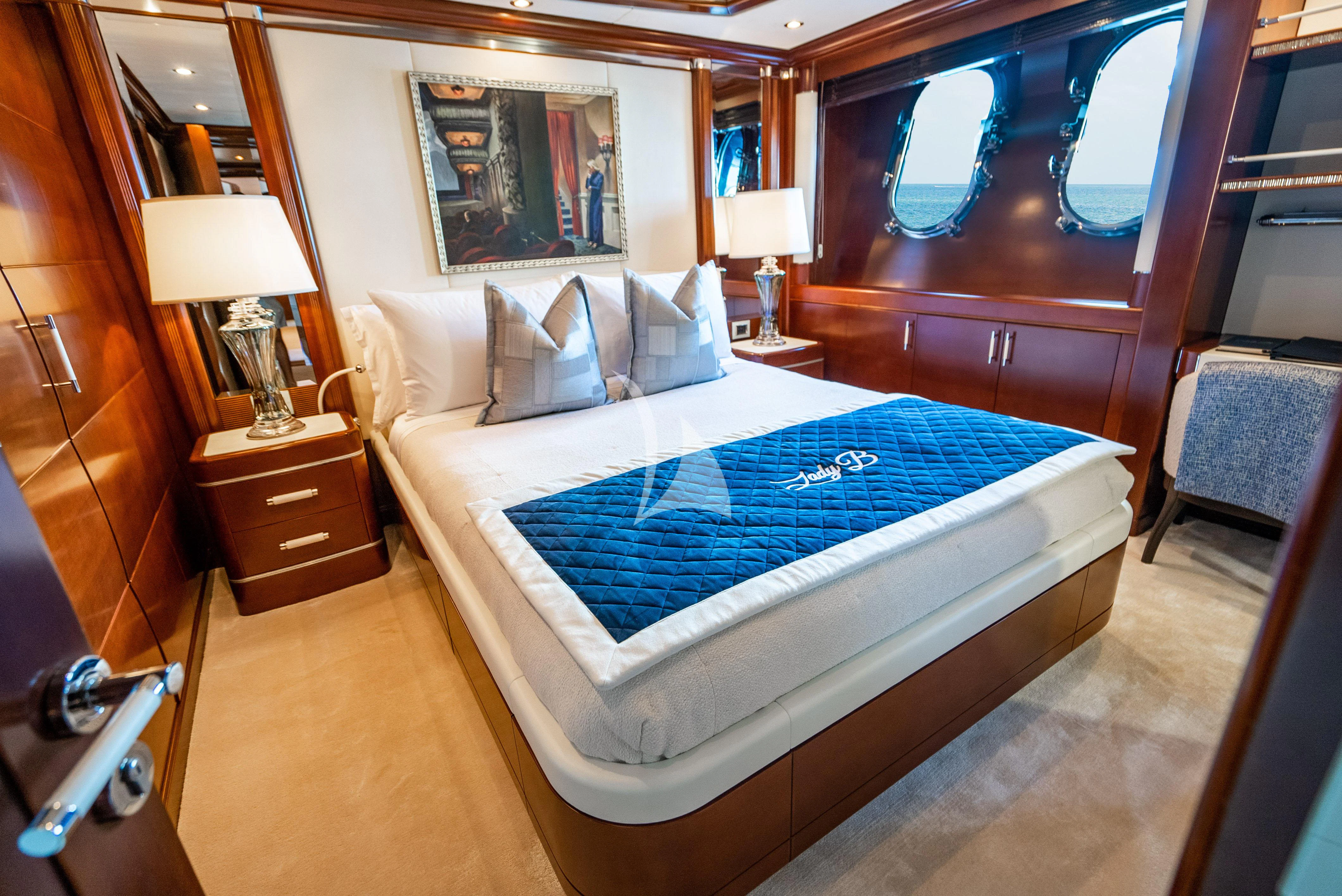 a bed in a room aboard LADY B Yacht for Charter