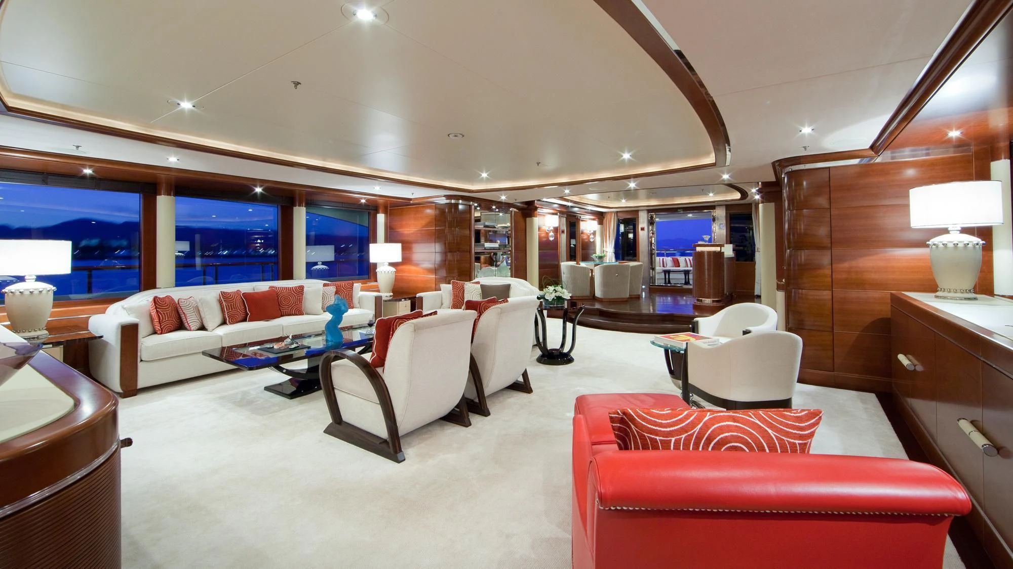 a large room with a couch and a table aboard LADY B Yacht for Charter