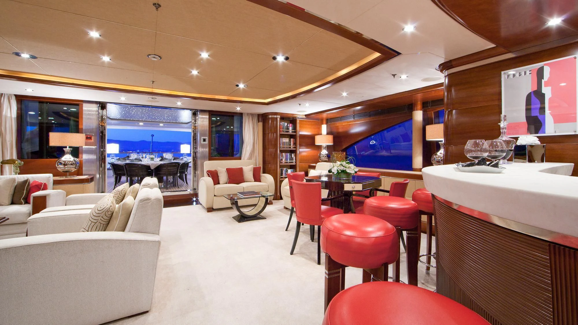 a room with a couch and a table and chairs aboard LADY B Yacht for Charter