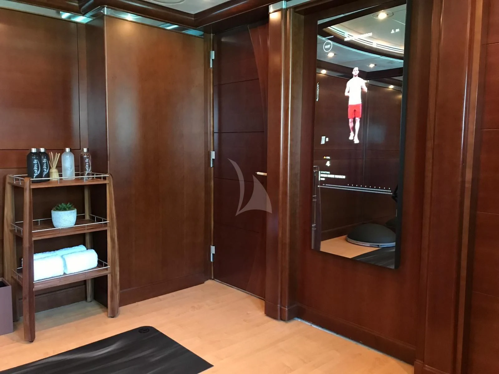 a person standing in a room aboard LADY B Yacht for Charter