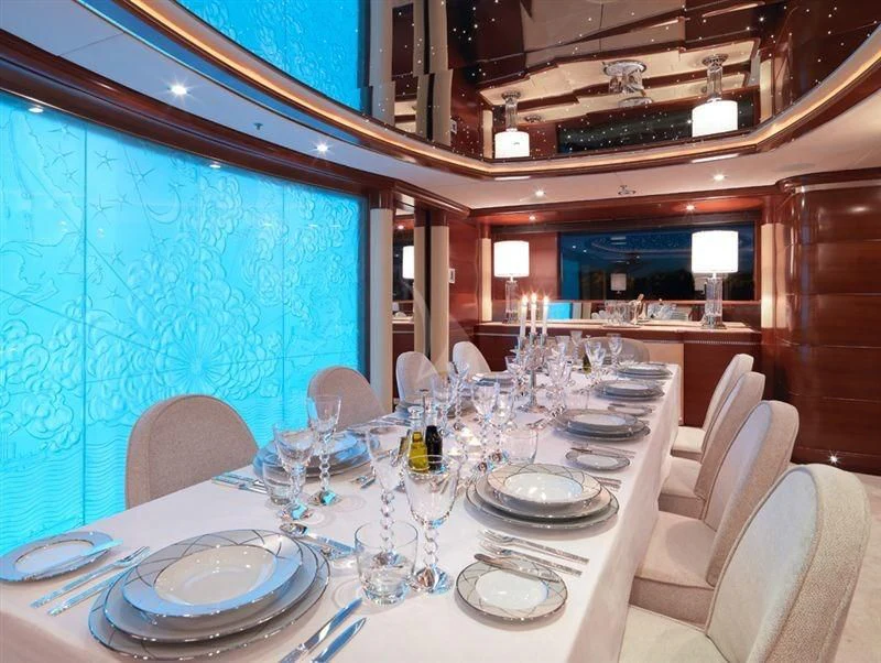 a table set for a dinner aboard LADY B Yacht for Charter