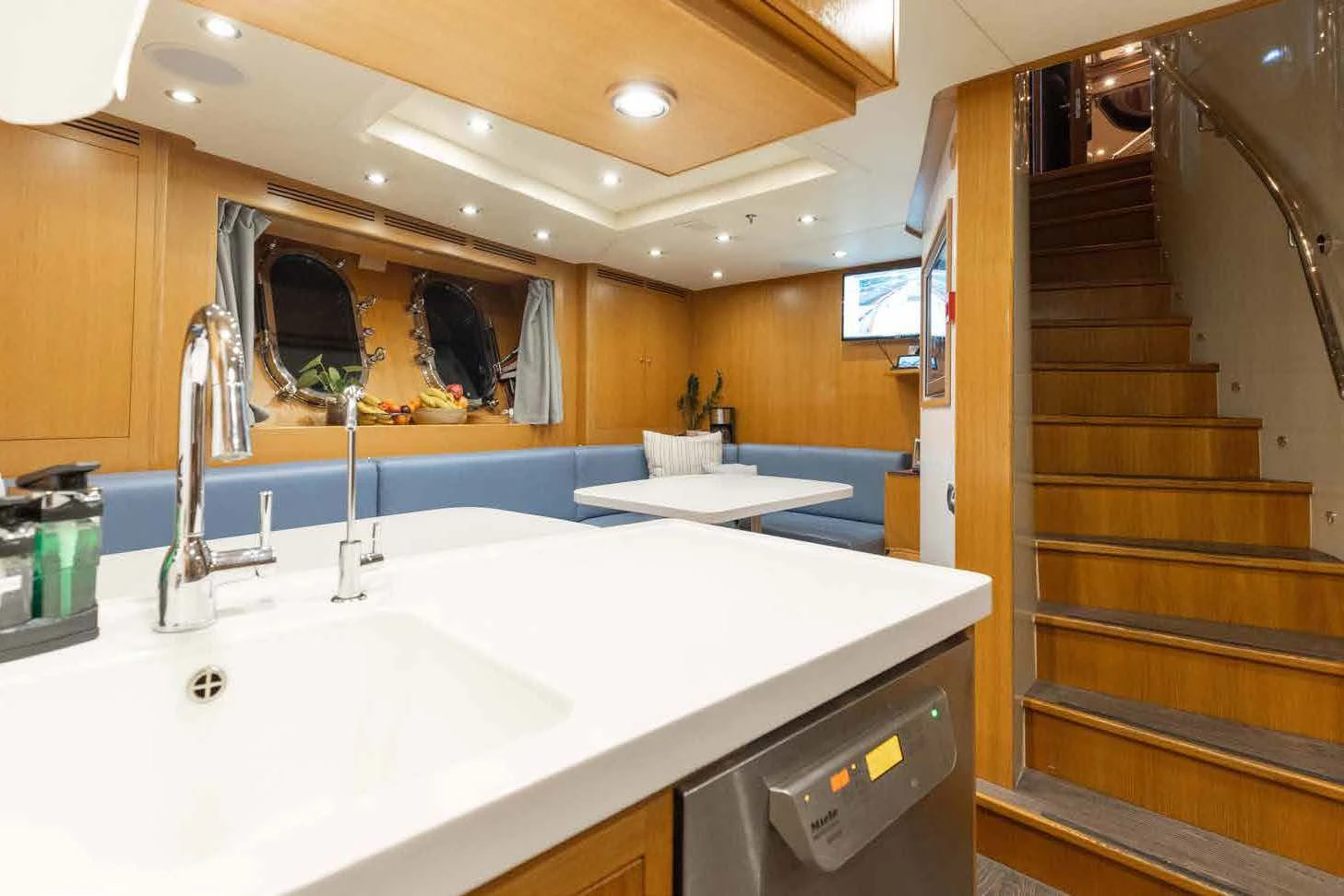 a bathroom with a sink and a mirror aboard LADY B Yacht for Charter