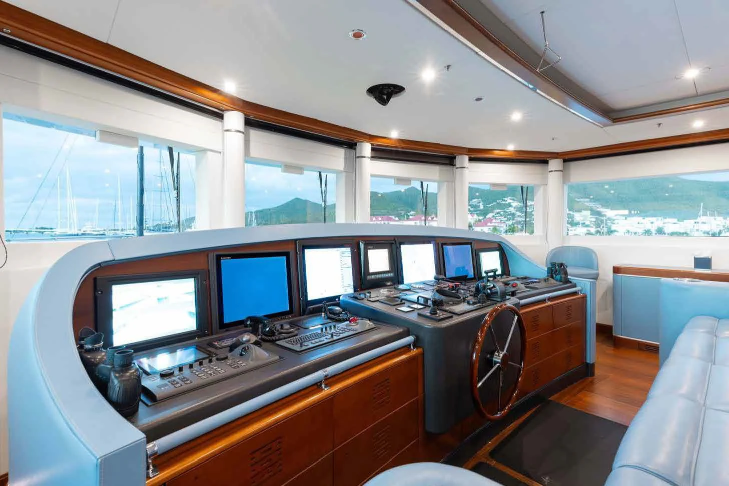 a control room with many computers aboard LADY B Yacht for Charter