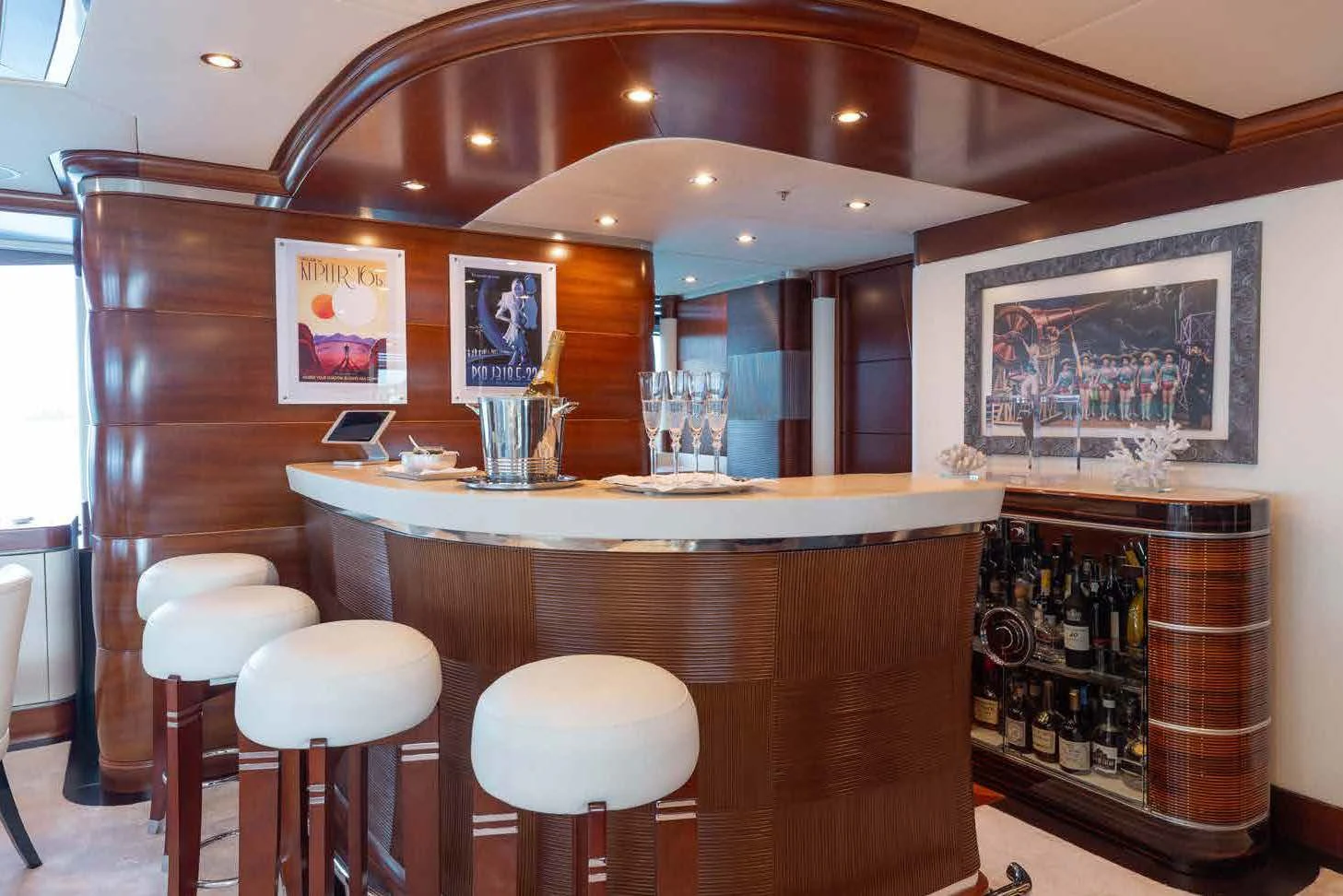 a bar with a bar and stools aboard LADY B Yacht for Charter