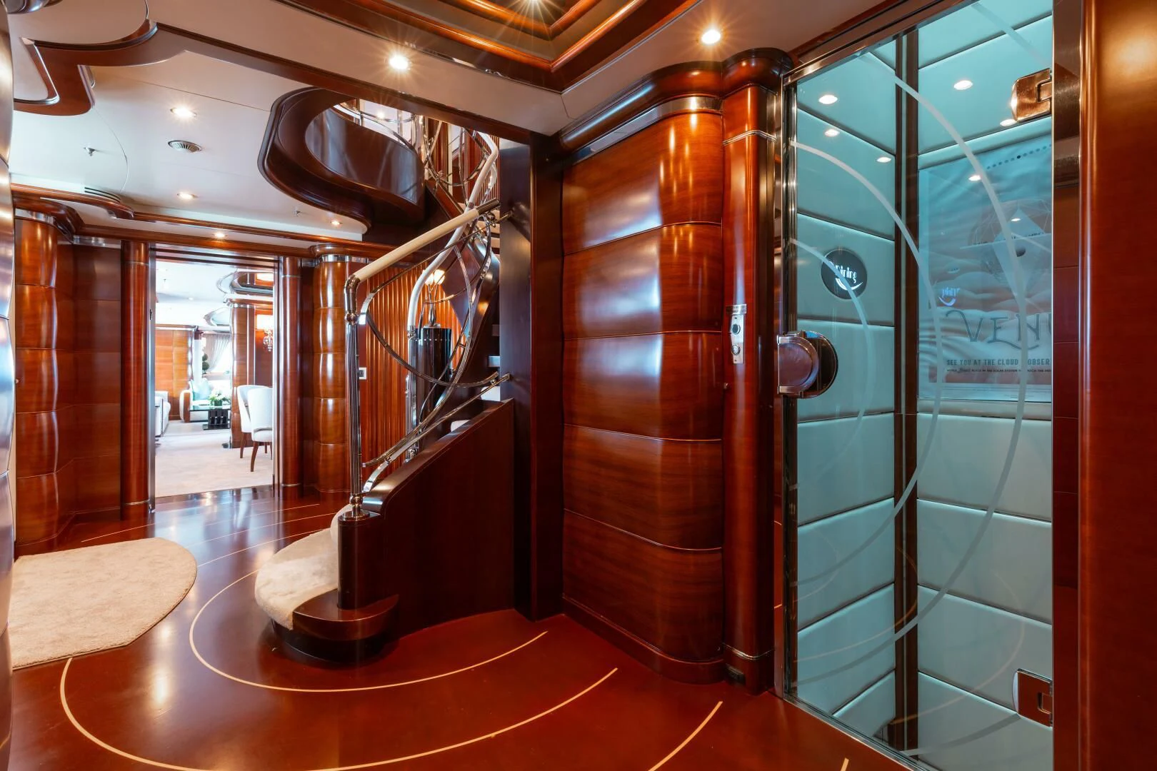 a large room with glass walls aboard LADY B Yacht for Charter