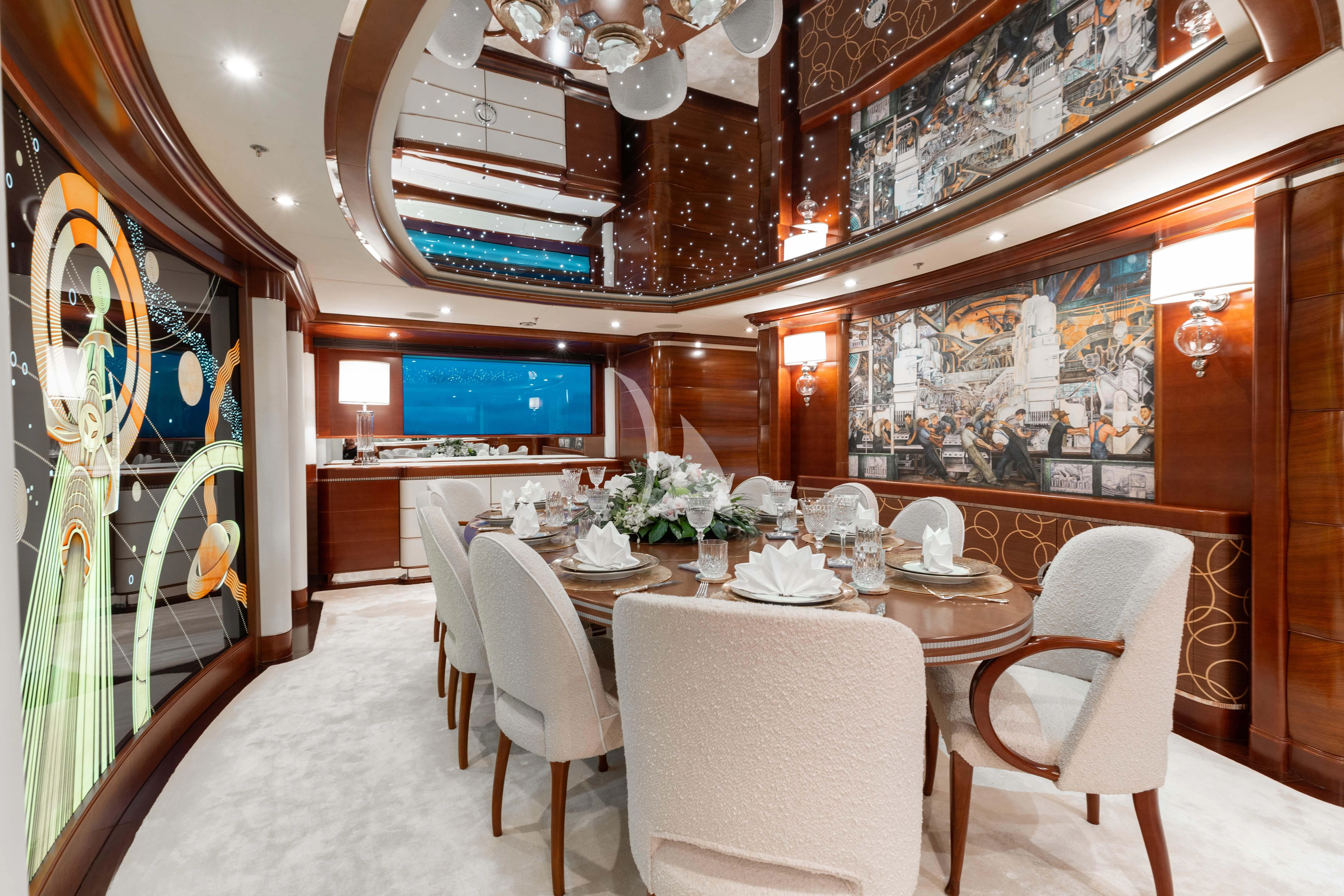 a dining room with a table and chairs aboard LADY B Yacht for Charter