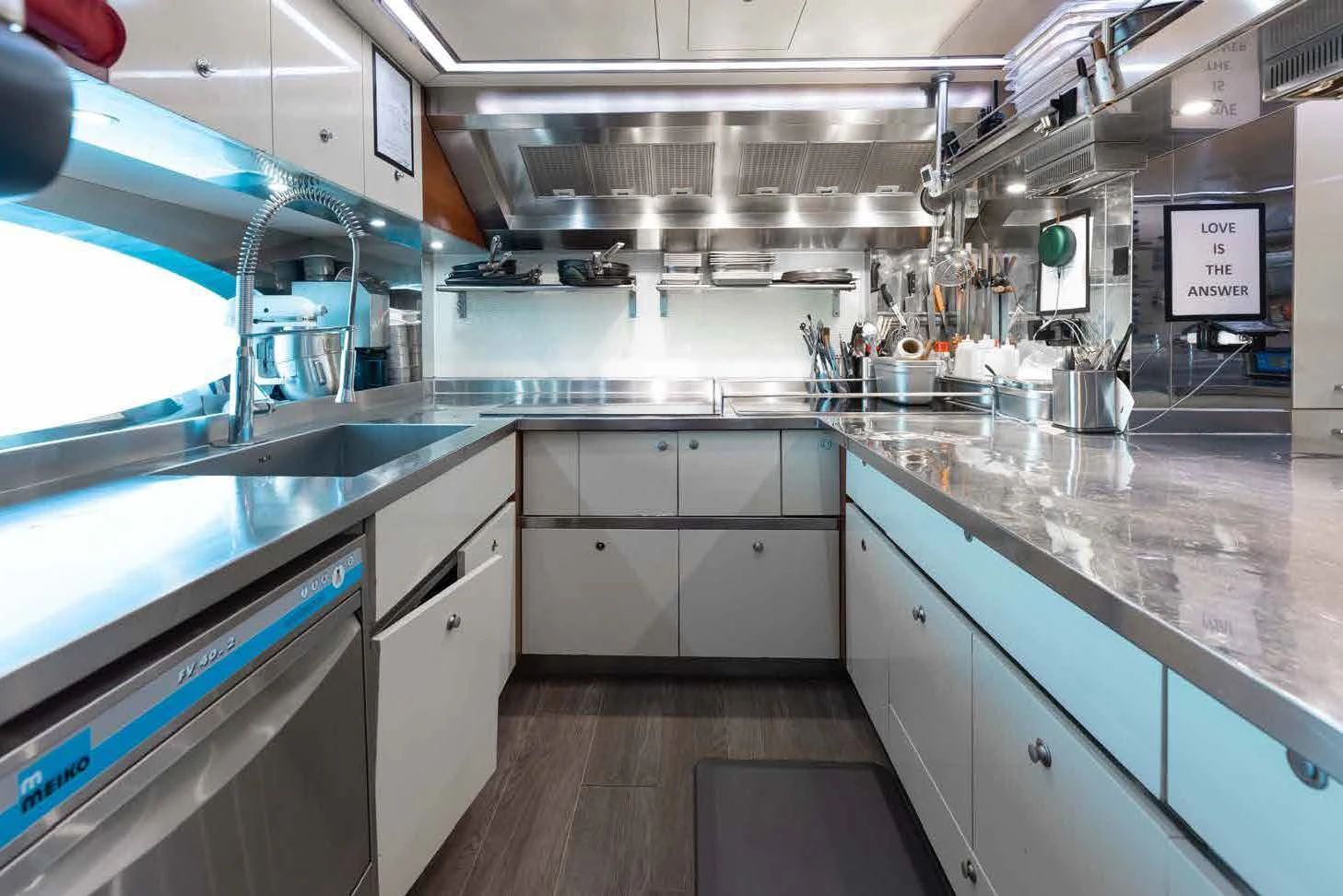 a kitchen with stainless steel appliances aboard LADY B Yacht for Charter