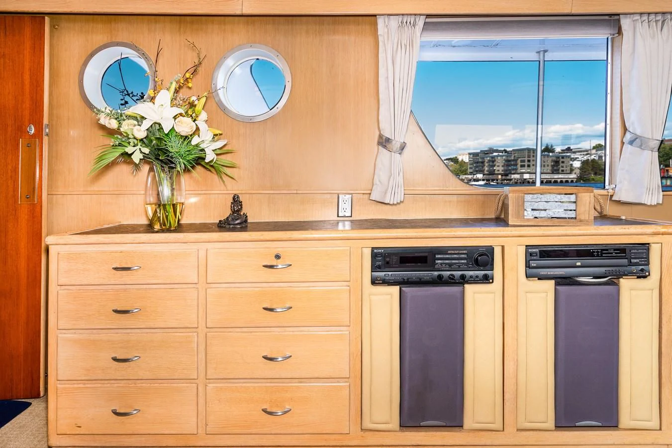 a kitchen with a large window aboard SEA STAR Yacht for Sale