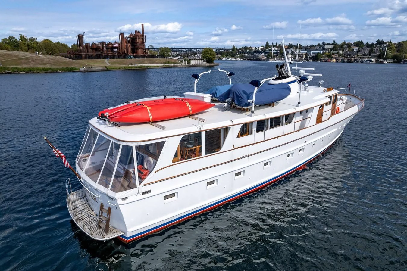 a boat with a cover on the front aboard SEA STAR Yacht for Sale