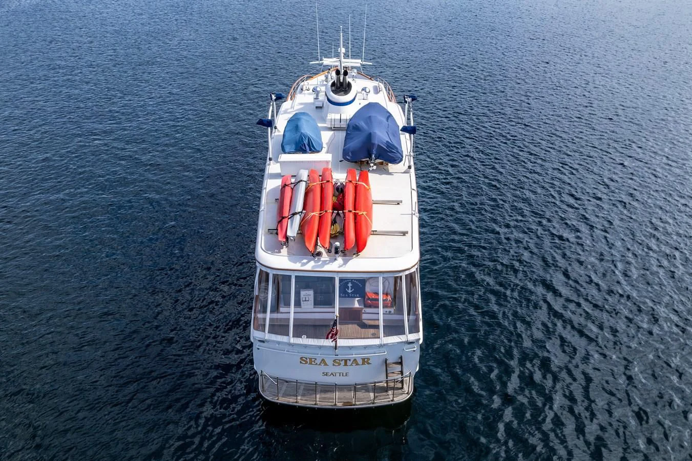 a boat with a lot of stuff on it aboard SEA STAR Yacht for Sale