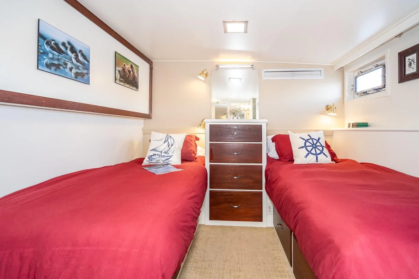 a room with two beds aboard SEA STAR Yacht for Sale