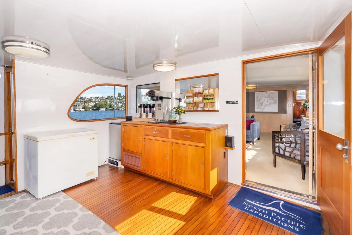 a kitchen with a sink and a mirror aboard SEA STAR Yacht for Sale
