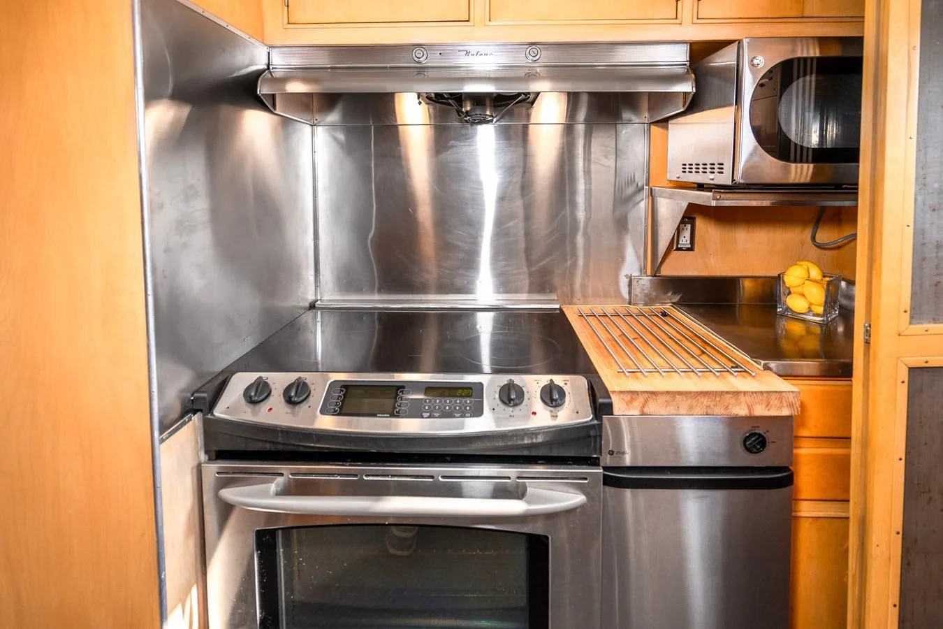 a stainless steel stove in a kitchen aboard SEA STAR Yacht for Sale