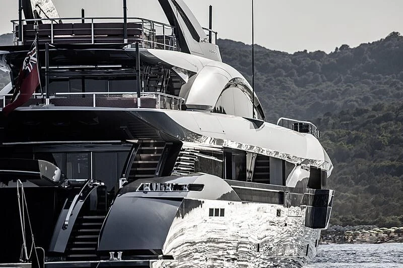 a boat on a rocky beach aboard FLYING DAGGER III Yacht for Sale