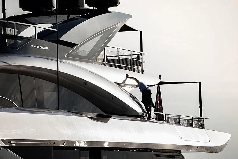 a person on a boat aboard FLYING DAGGER III Yacht for Sale