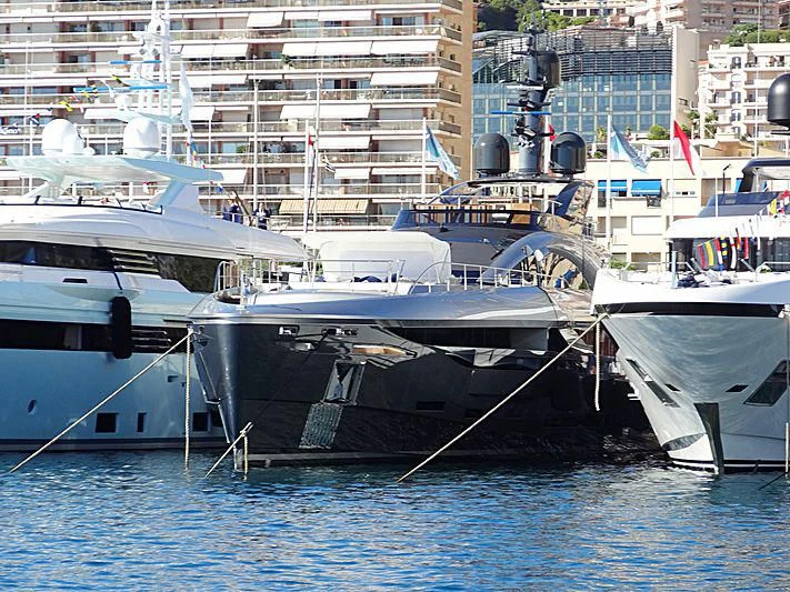 several boats docked at a pier aboard FLYING DAGGER III Yacht for Sale