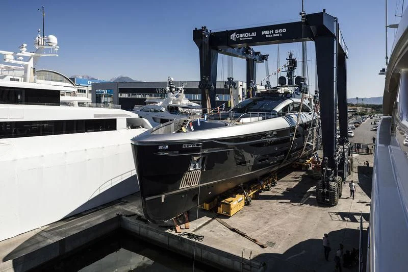 a boat docked at a pier aboard FLYING DAGGER III Yacht for Sale
