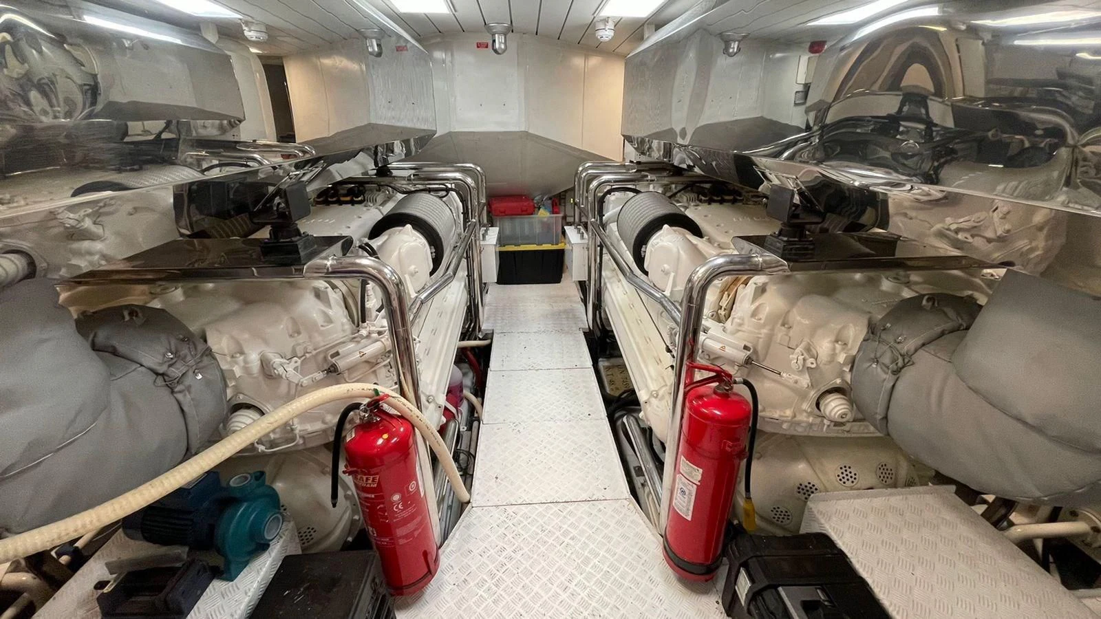 a car with a red can in a garage aboard VICTORIOUS Yacht for Sale