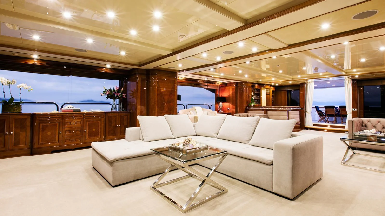 a living room with a large window aboard THE STAR Yacht for Sale
