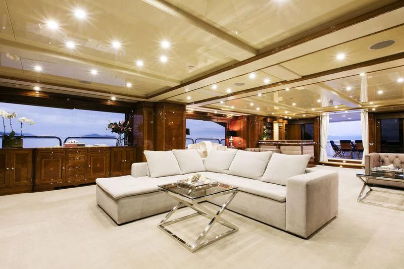 a living room with a large window aboard THE STAR Yacht for Sale
