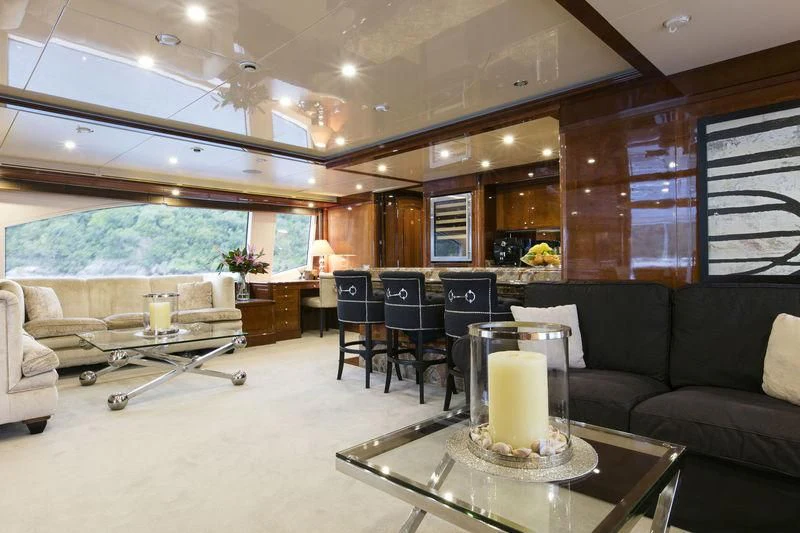 a living room with a large window aboard THE STAR Yacht for Sale