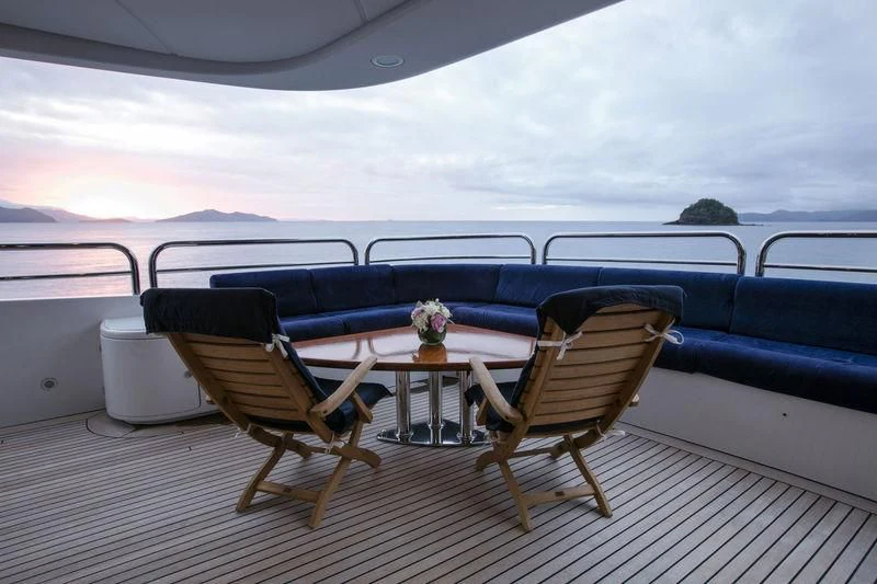 a couple of chairs on a boat aboard THE STAR Yacht for Sale