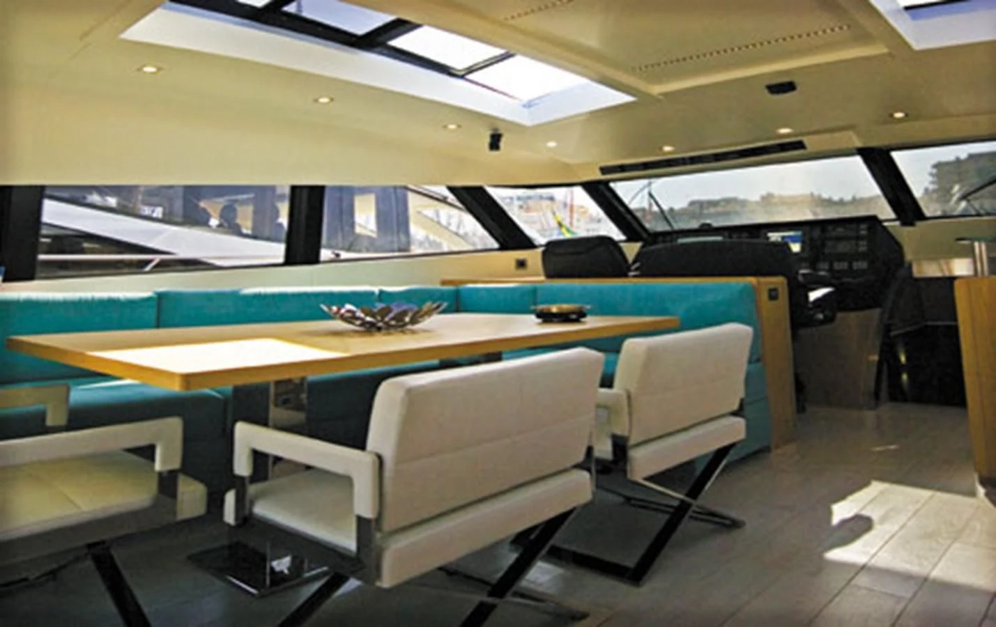 a pool table and chairs in a room with a pool table aboard CNM CONTINENTAL 80 Yacht for Sale