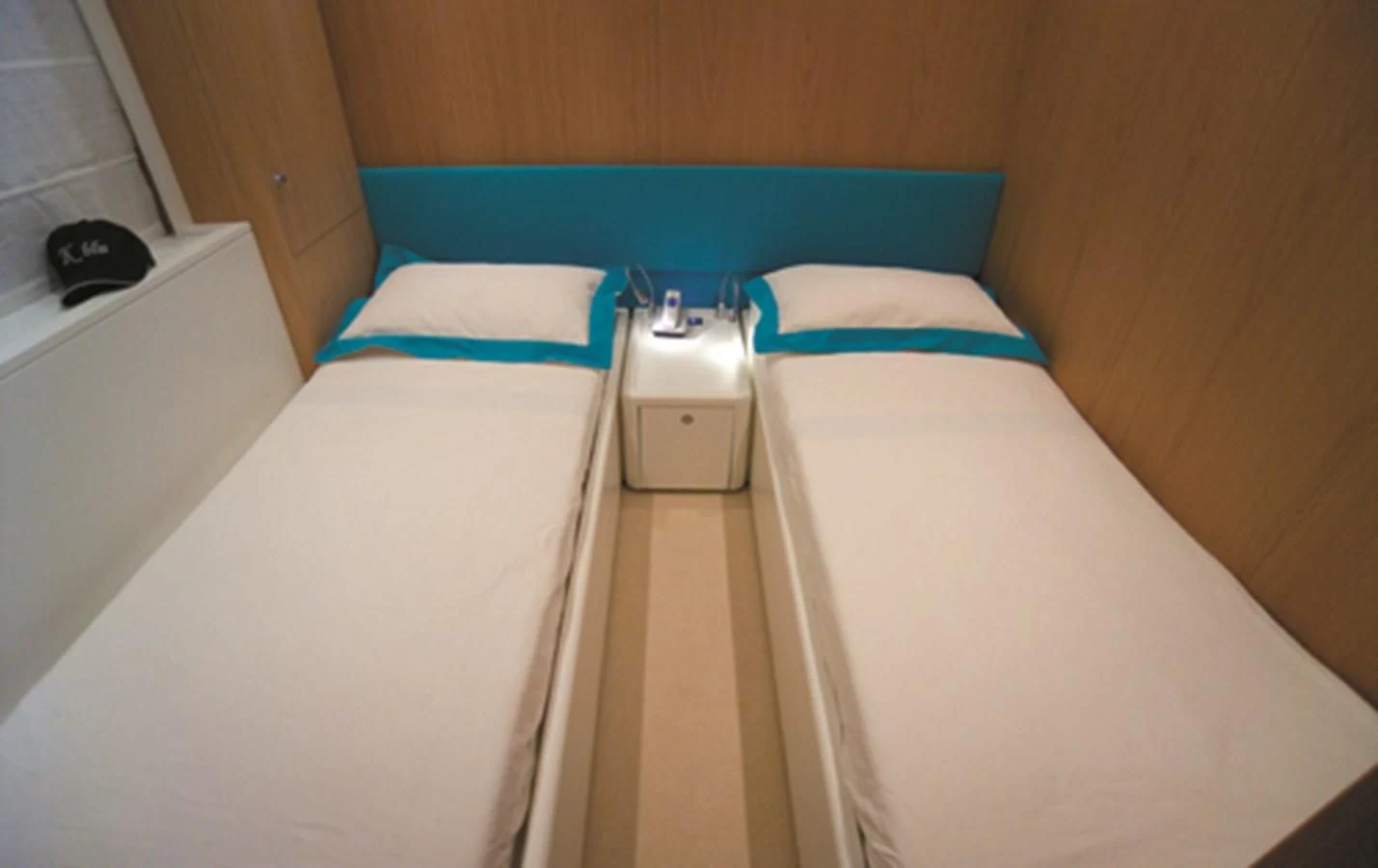 a bedroom with a bed and a window aboard CNM CONTINENTAL 80 Yacht for Sale