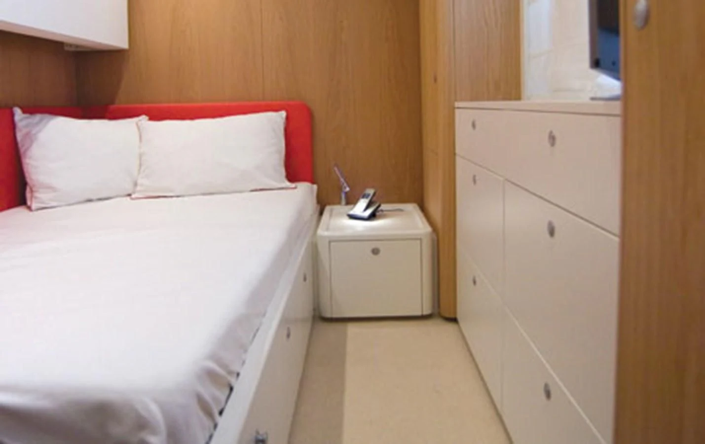 a bed in a room aboard CNM CONTINENTAL 80 Yacht for Sale