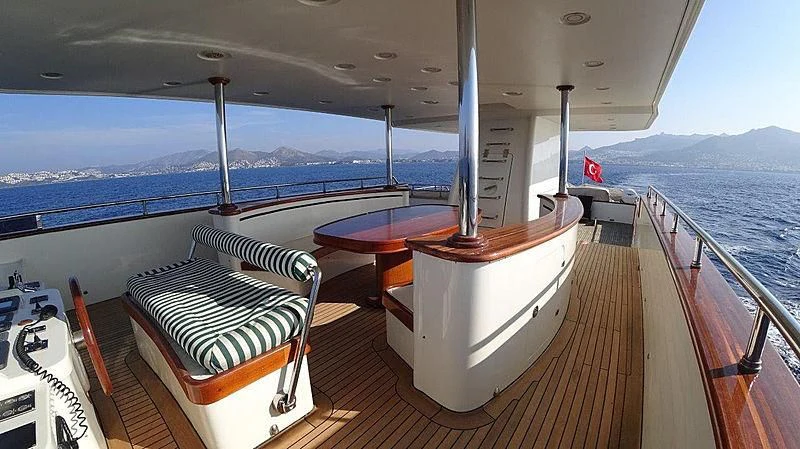 a boat on a deck aboard KUYIS Yacht for Sale