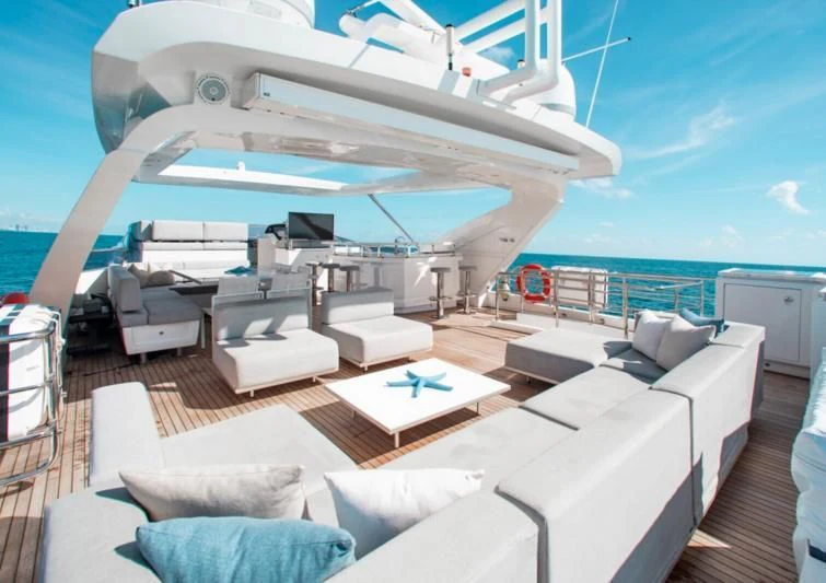 a large white boat on a boat aboard INDIGO Yacht for Sale