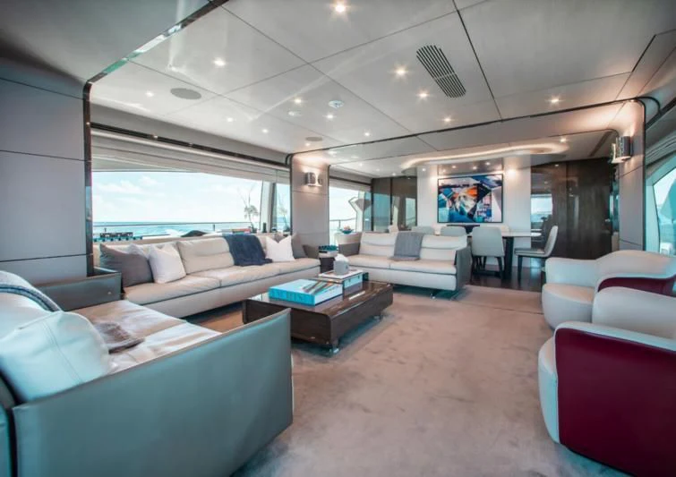 a living room with a large window aboard INDIGO Yacht for Sale