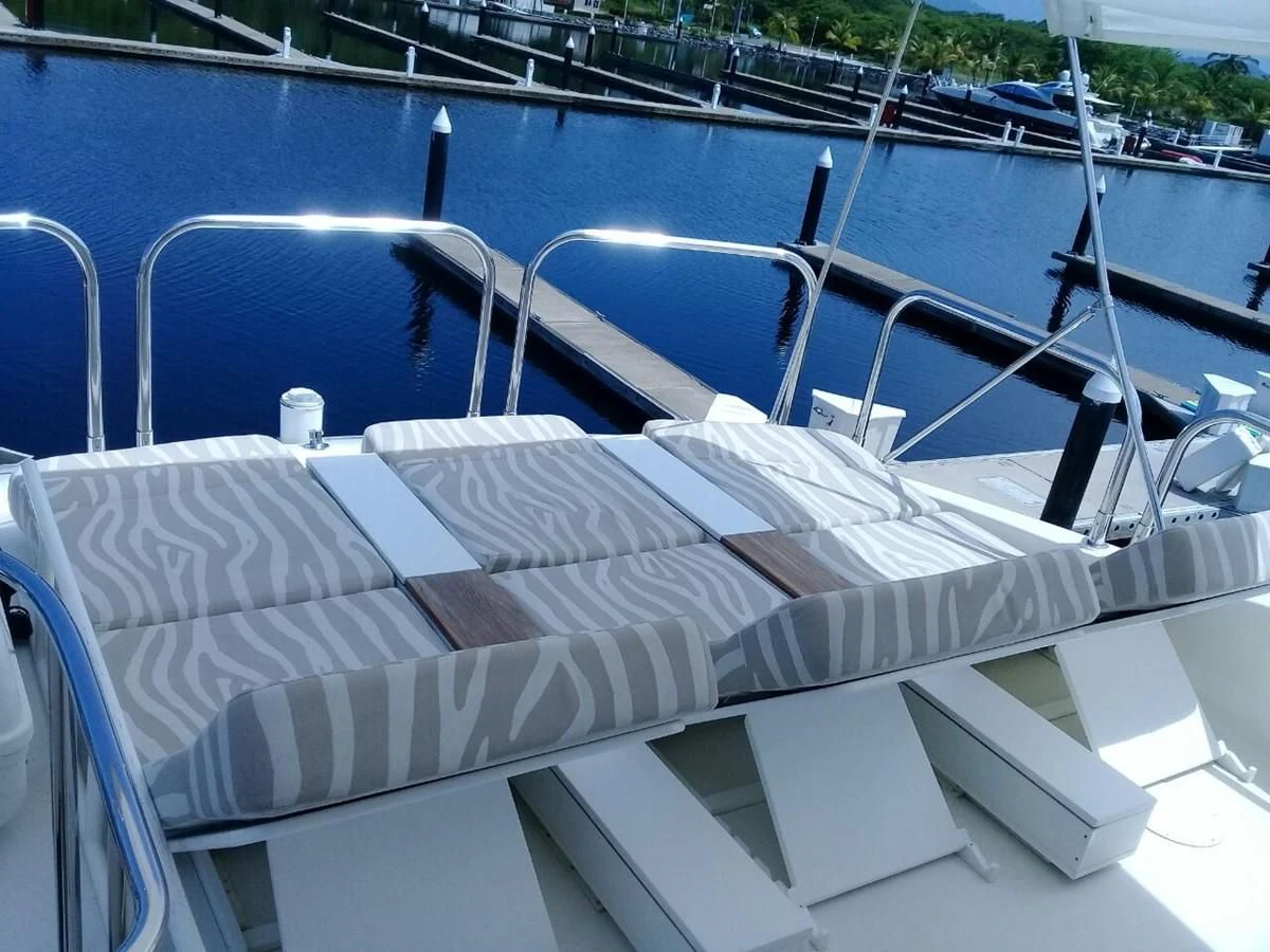 a boat on the water aboard LAZZARA 68' Yacht for Sale