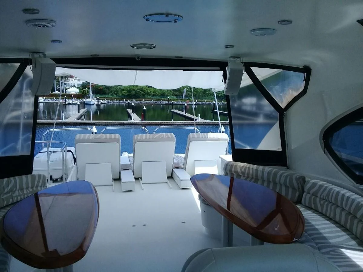 a boat on the water aboard LAZZARA 68' Yacht for Sale