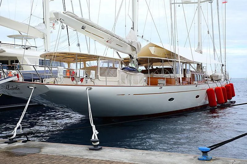 a boat docked at a pier aboard ADELE Yacht for Sale
