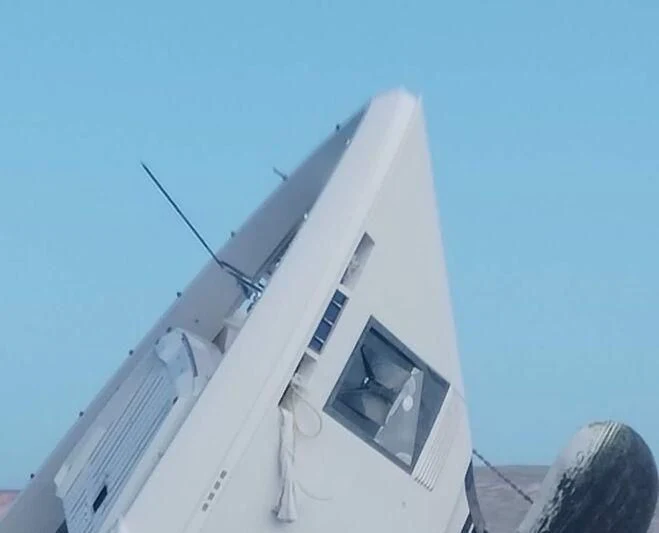 a white building with a tower aboard RICACHA' Yacht for Sale