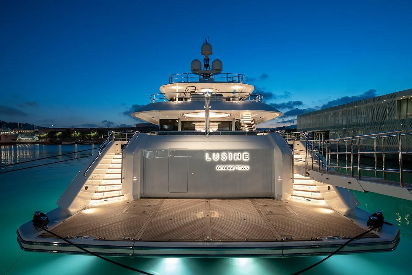 a large ship docked at a pier aboard LUSINE Yacht for Sale