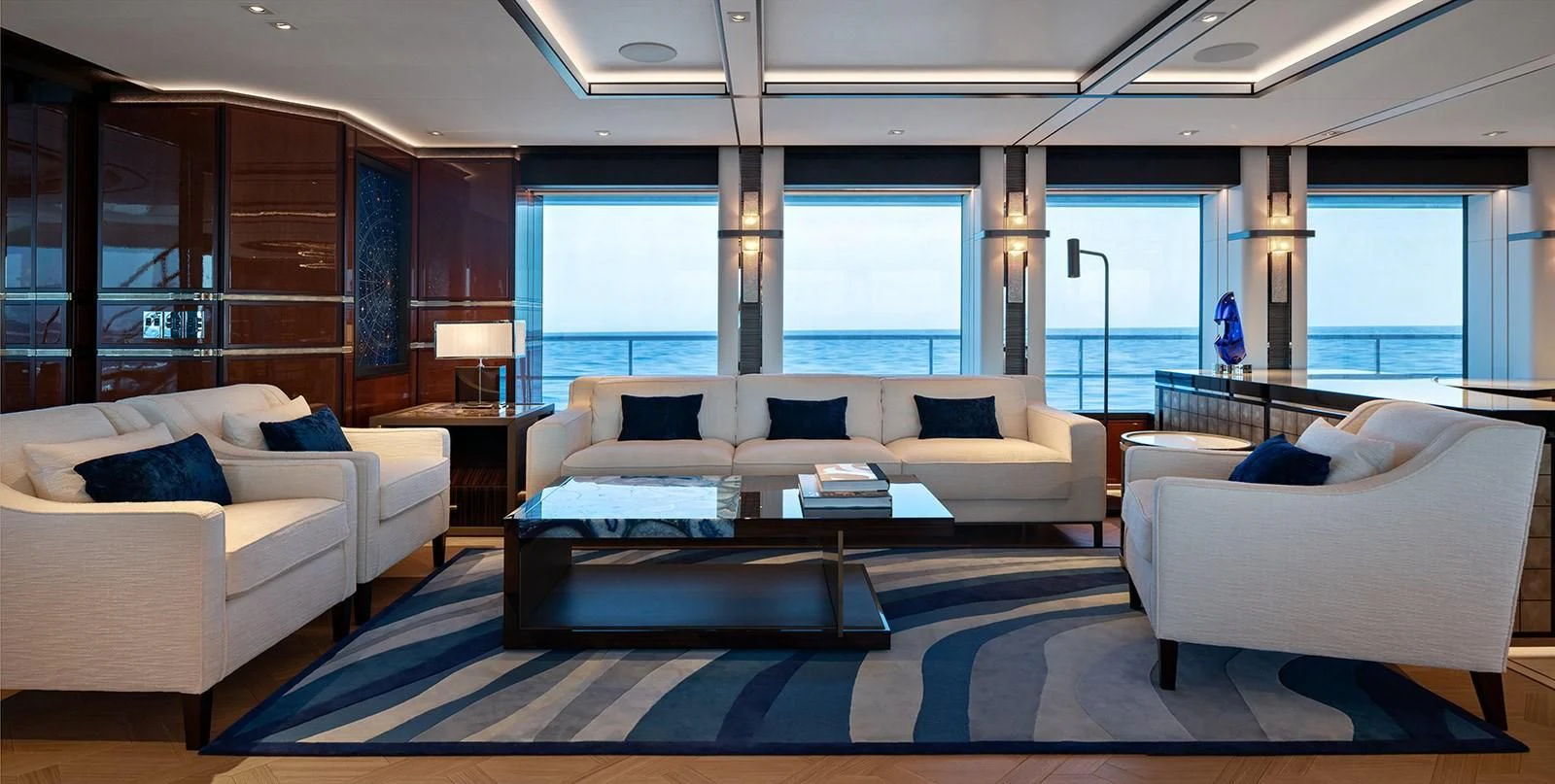 a large living room with a large window aboard LUSINE Yacht for Sale