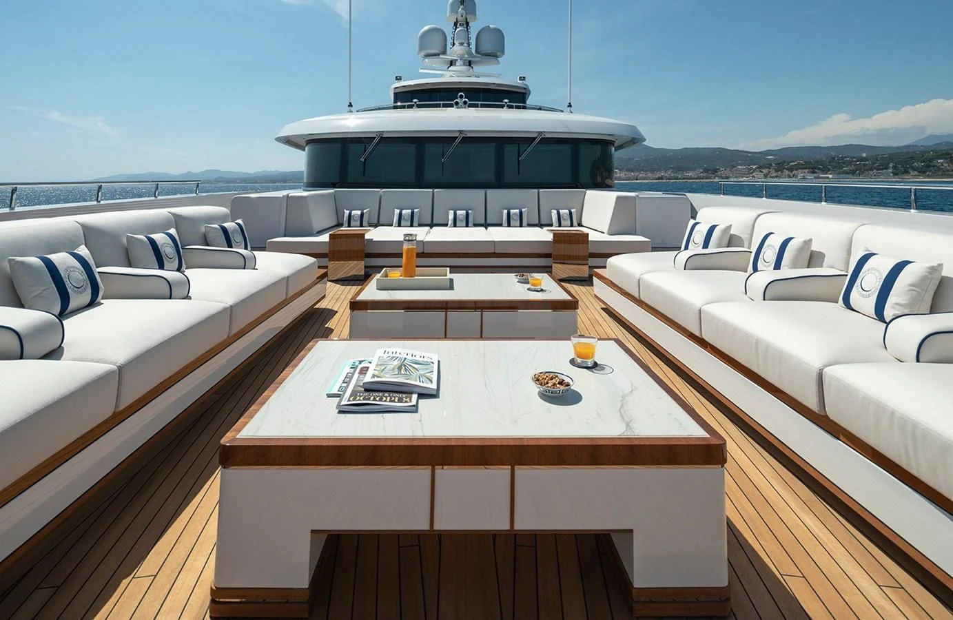a room with a table and chairs aboard LUSINE Yacht for Sale