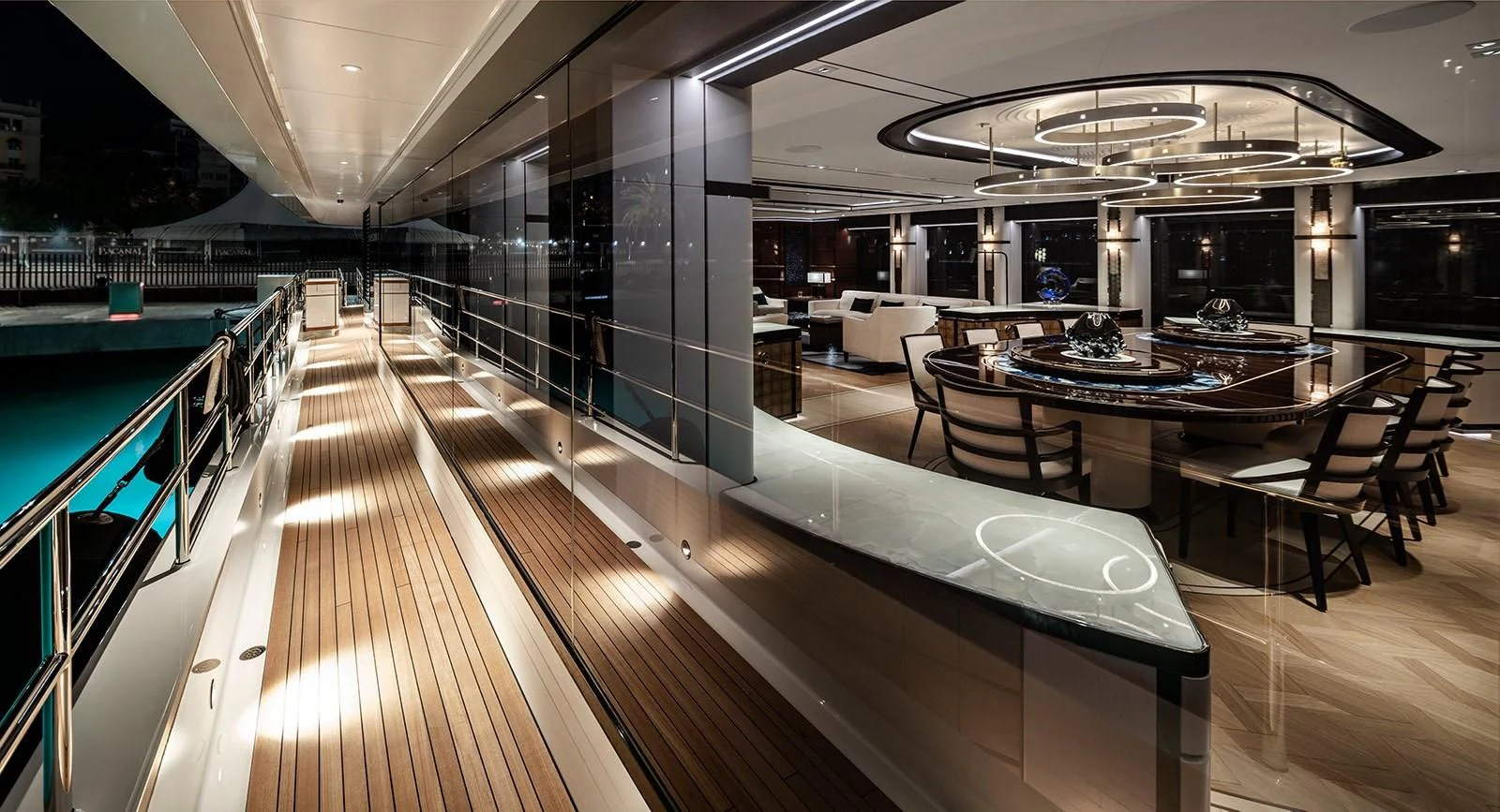 a room with a pool table and chairs aboard LUSINE Yacht for Sale