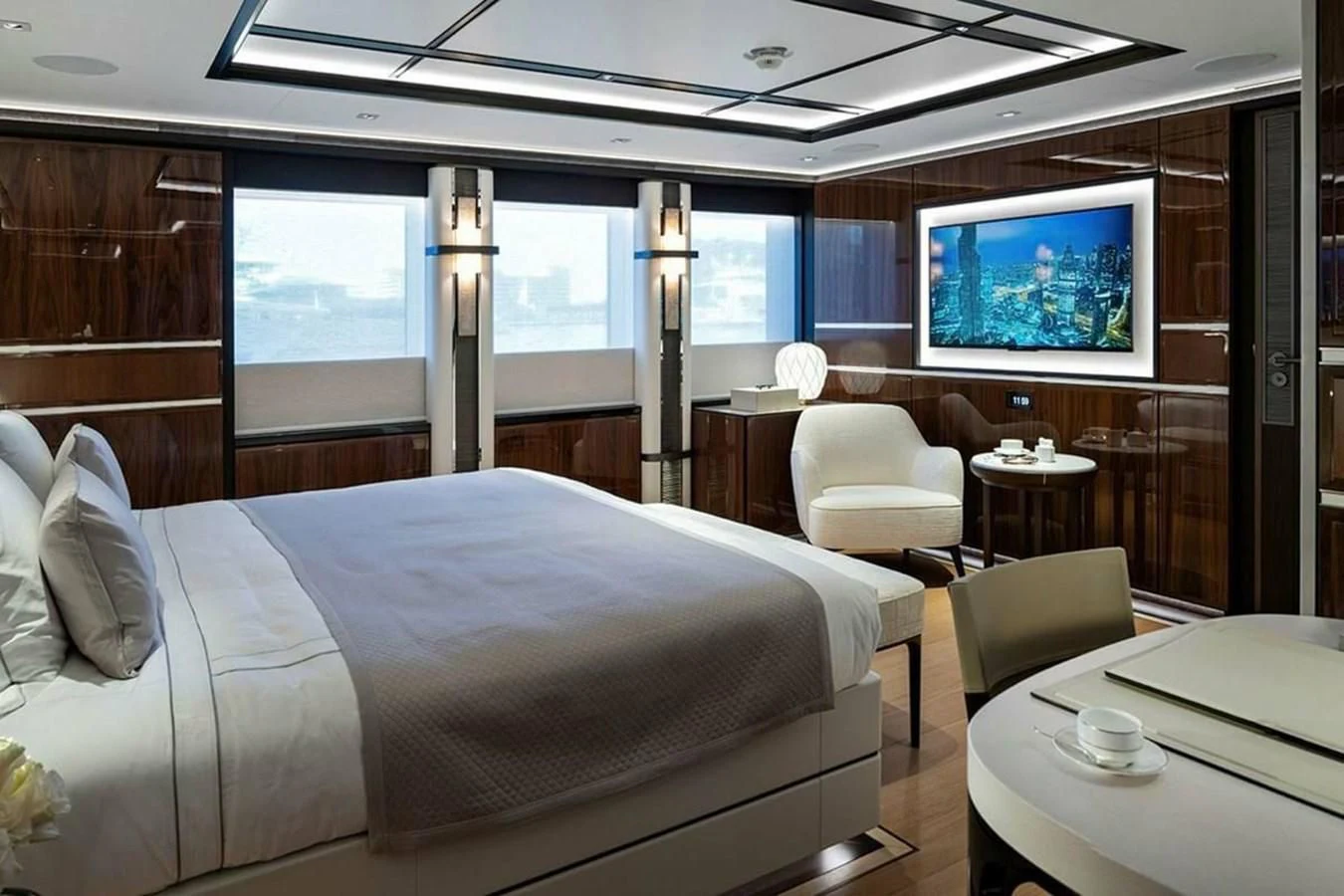 a room with a bed and a tv aboard LUSINE Yacht for Sale