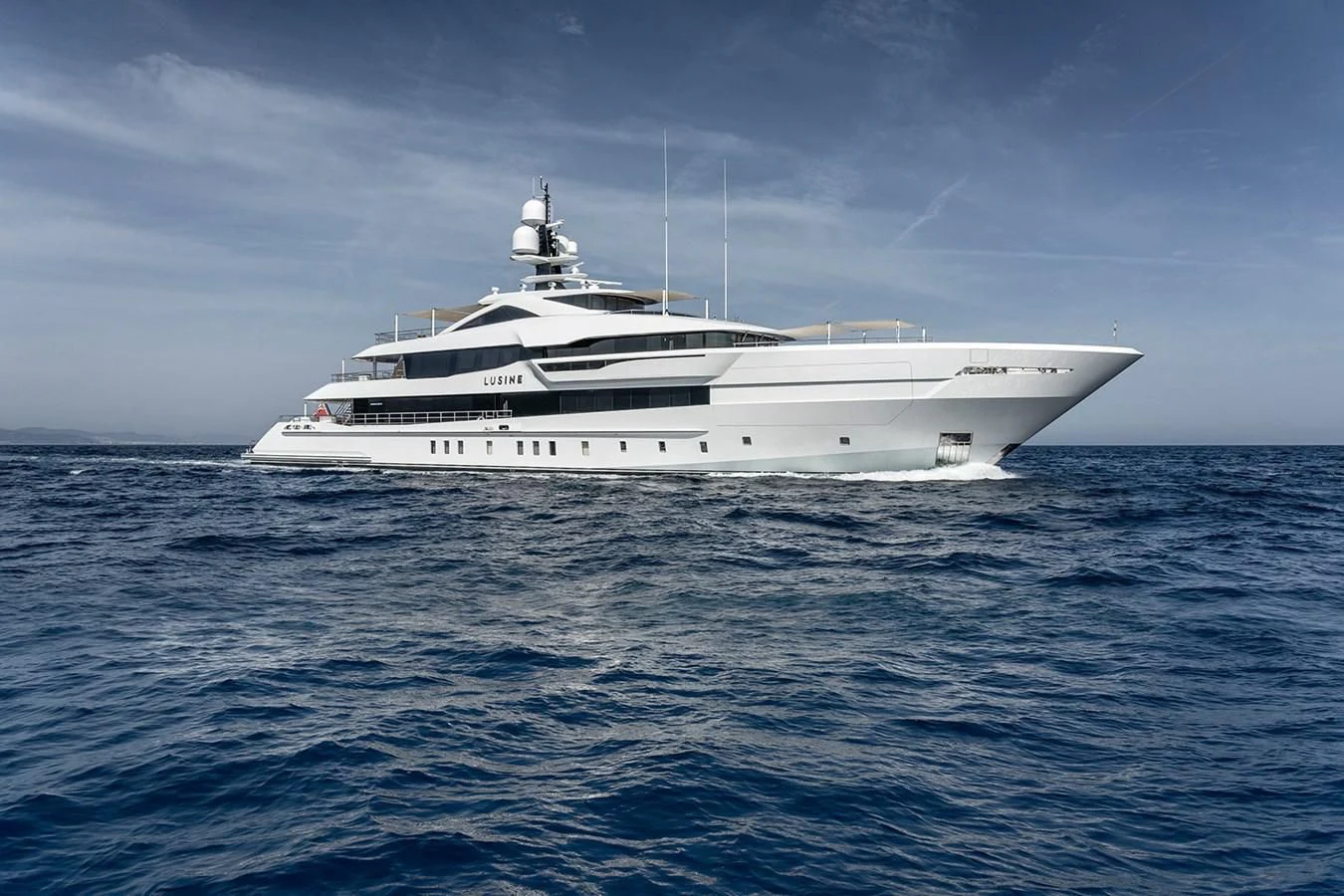 a white yacht in the water aboard LUSINE Yacht for Sale