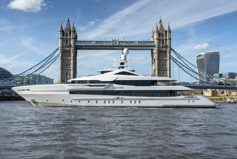 a large white boat in the water aboard LUSINE Yacht for Sale