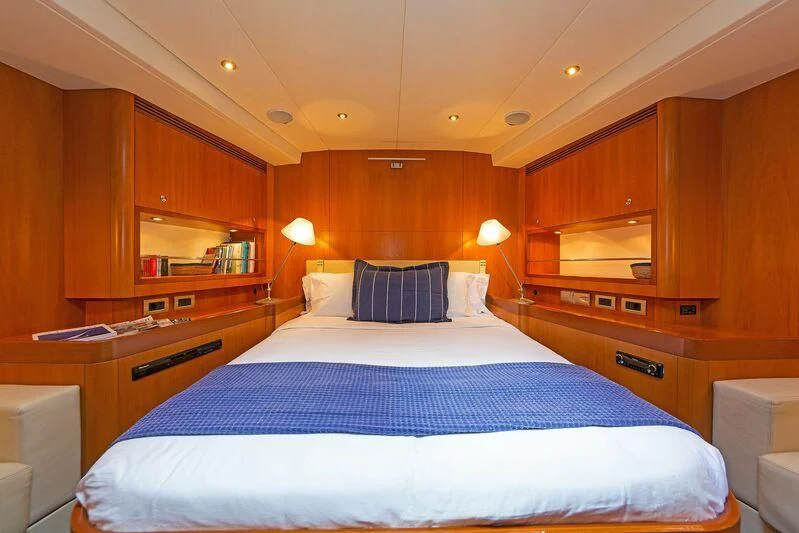 a bed in a room aboard MELITI Yacht for Sale