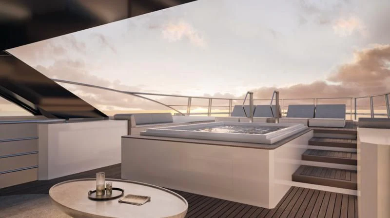 a room with a table and a view of the water aboard ENTOURAGE Yacht for Sale