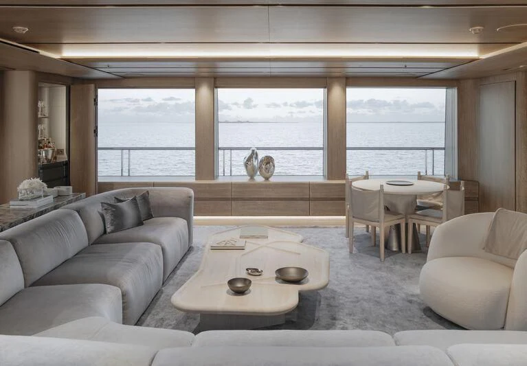 a living room with a large window aboard ENTOURAGE Yacht for Sale