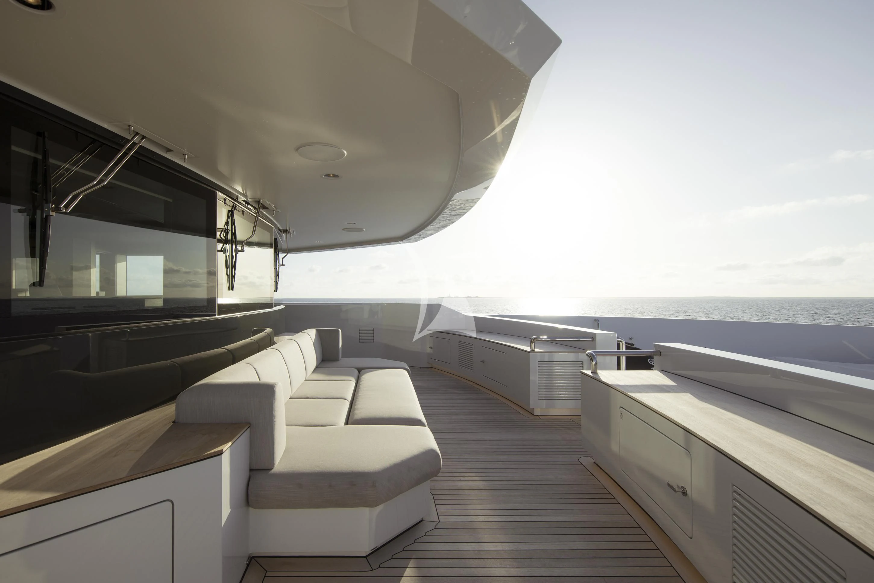 a room with a large tub and couches aboard ENTOURAGE Yacht for Sale