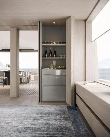 a room with a glass door and a glass wall with a glass door aboard ENTOURAGE Yacht for Sale
