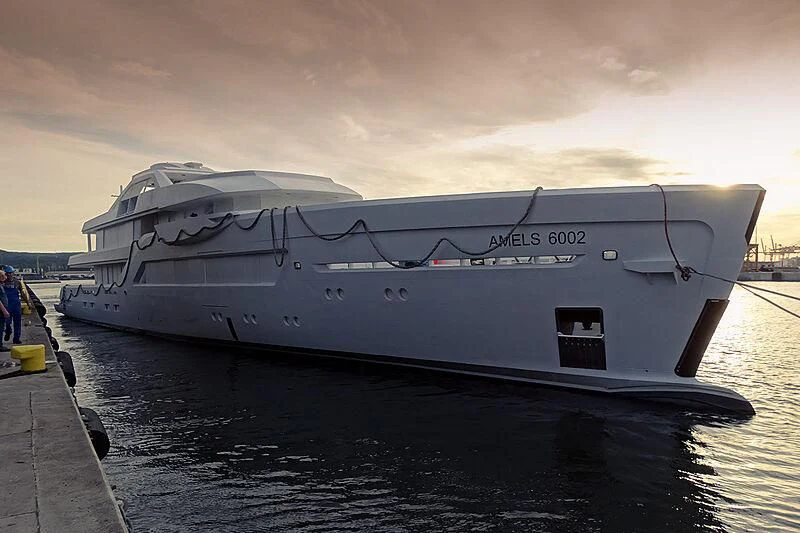 a white yacht on the water aboard ENTOURAGE Yacht for Sale
